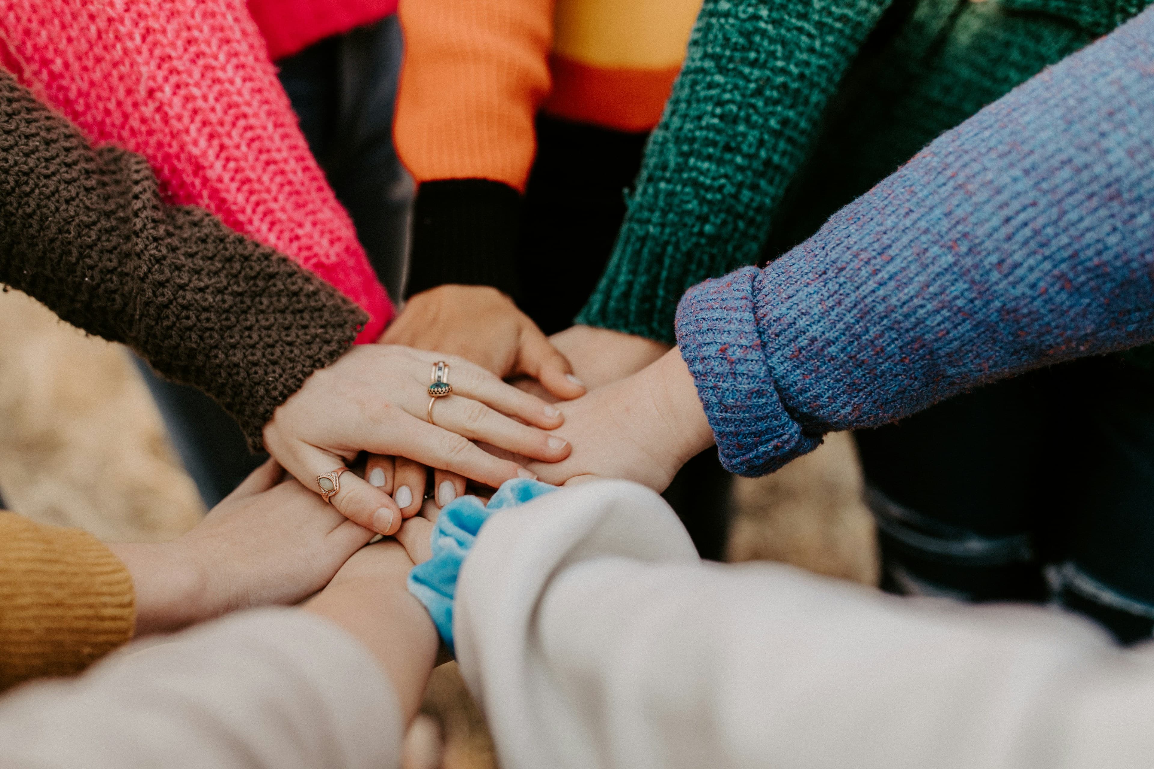 Hands joined together in a circle